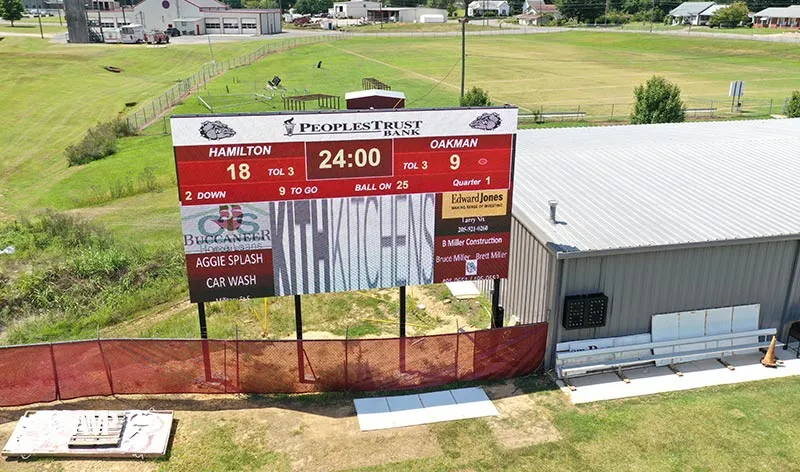 A scoreboard on football court