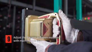 A LED screen operator is adjusting the flatness of LED screen using a tool